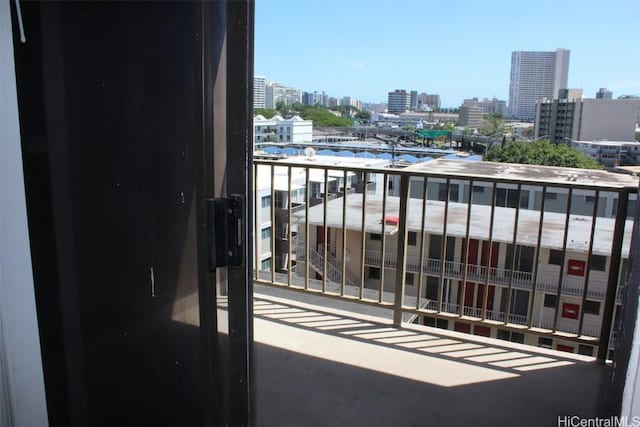 balcony featuring a view of city