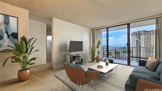 98-500 Koauka Loop Unit 10H, Aiea, HI 96701 - living room with carpet floors, floor to ceiling windows, and a textured ceiling