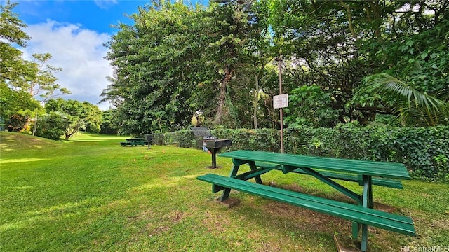 98-500 Koauka Loop Unit 10H, Aiea, HI 96701 - view of home's community featuring a lawn