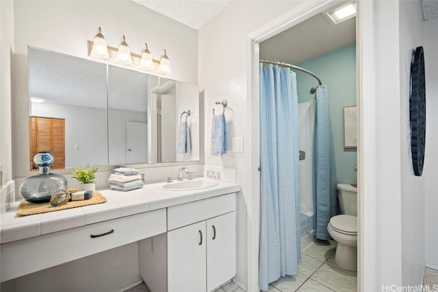 full bath with tile patterned floors, toilet, curtained shower, and vanity