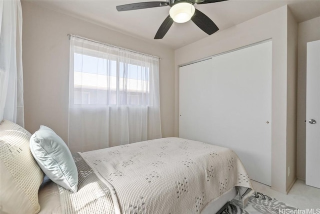 bedroom with a closet and a ceiling fan