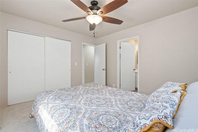 bedroom featuring a closet, carpet flooring, and ceiling fan