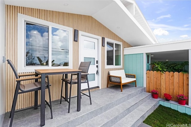 view of patio featuring fence