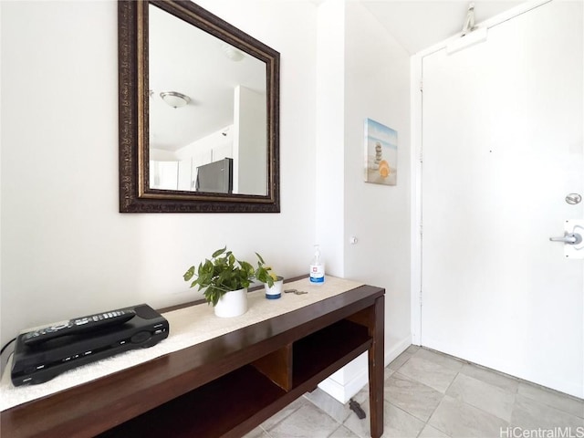 interior space with light tile patterned flooring