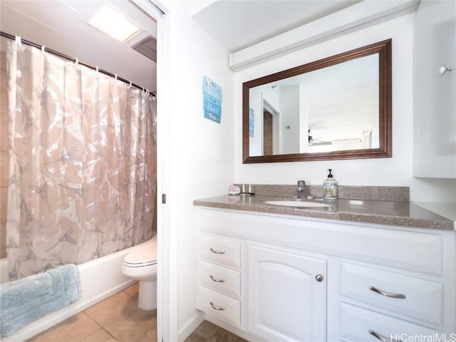 full bathroom with toilet, tile patterned floors, shower / bath combo with shower curtain, and vanity