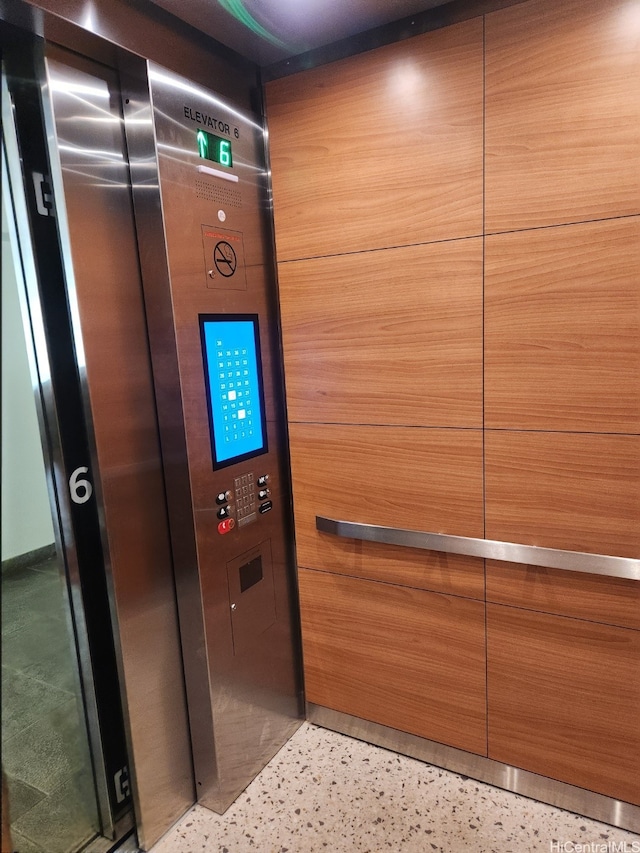 201 Ohua Ave Unit 1803, Honolulu, HI 96815 - elevator with speckle patterned floor