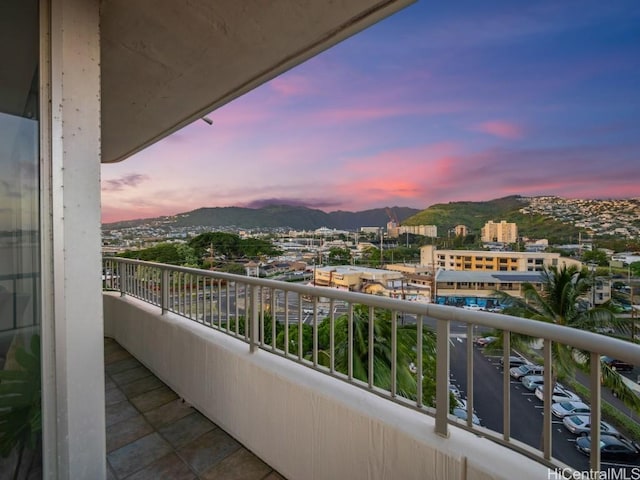 balcony at dusk with a mountain view