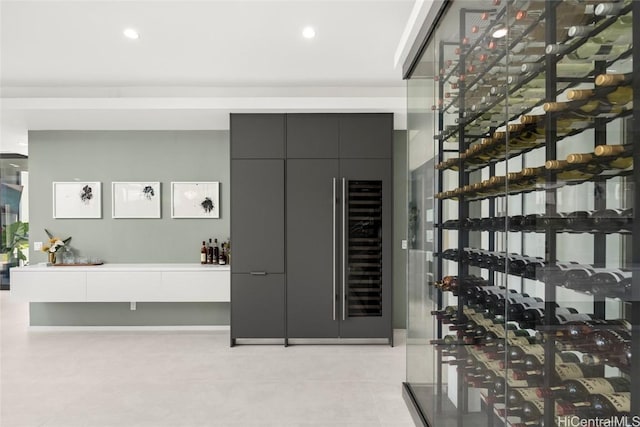 wine area with recessed lighting and light tile patterned flooring