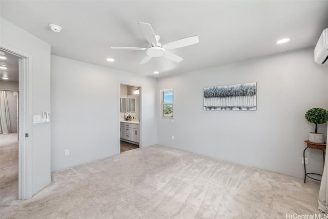 carpeted bedroom featuring recessed lighting, ceiling fan, and ensuite bathroom