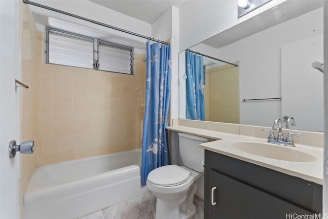 full bathroom featuring toilet, shower / bath combo, a textured ceiling, and vanity