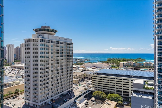 property's view of city featuring a water view