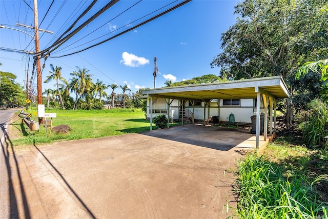 66-826 Haleiwa Rd, Haleiwa, HI 96712 - view of patio with concrete driveway, central air condition unit, and a carport
