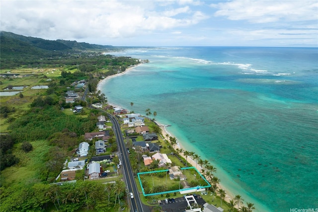 aerial view with a beach view and a water view