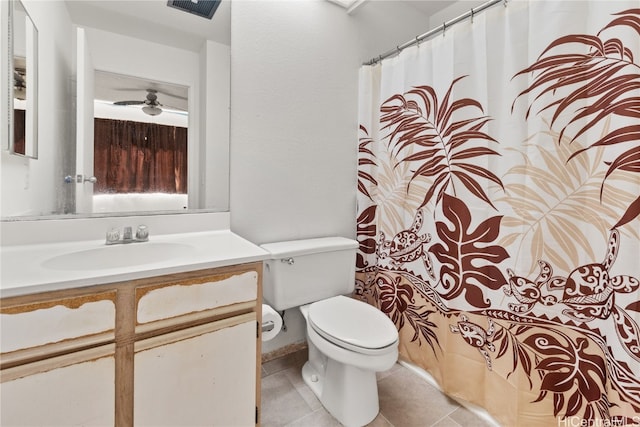 full bath with visible vents, a shower with shower curtain, toilet, vanity, and tile patterned floors