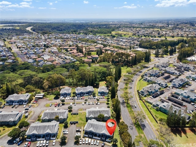 birds eye view of property with a residential view