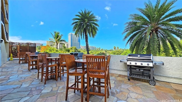 view of patio featuring outdoor dining area