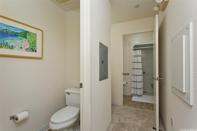 95-1050 Makaikai St Unit 14H, Mililani, HI 96789 - full bath with curtained shower, visible vents, electric panel, baseboards, and toilet