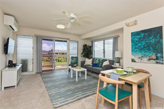 95-1050 Makaikai St Unit 14H, Mililani, HI 96789 - carpeted living room featuring a textured ceiling, ceiling fan, a wall unit AC, and baseboards
