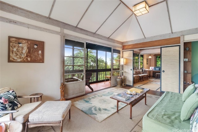 sunroom / solarium with vaulted ceiling