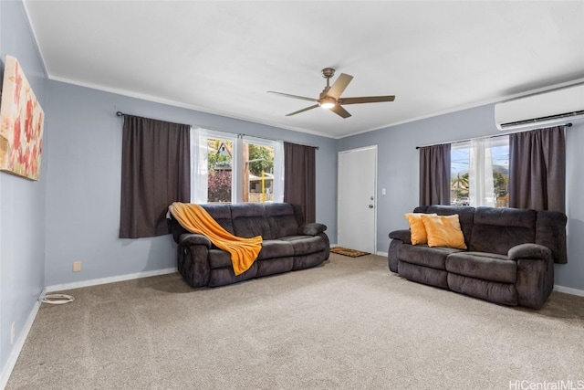 carpeted living room with ornamental molding, a wall mounted air conditioner, baseboards, and a ceiling fan