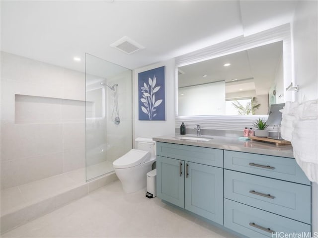 full bath featuring visible vents, toilet, vanity, a walk in shower, and recessed lighting