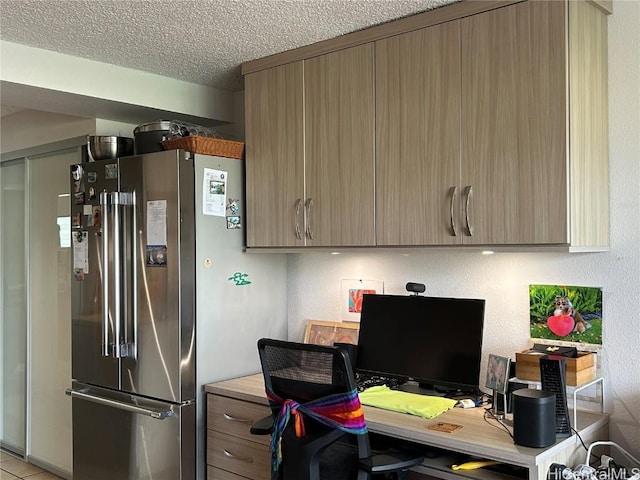 office area featuring a textured ceiling