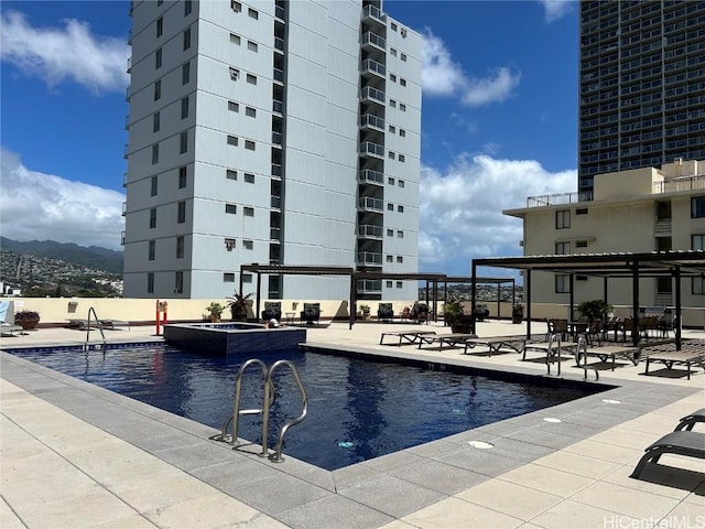 pool with a patio