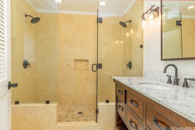 full bath with a stall shower, crown molding, and vanity