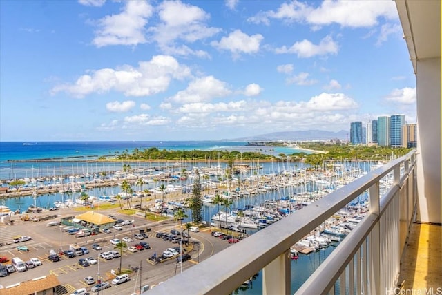 balcony featuring a water view