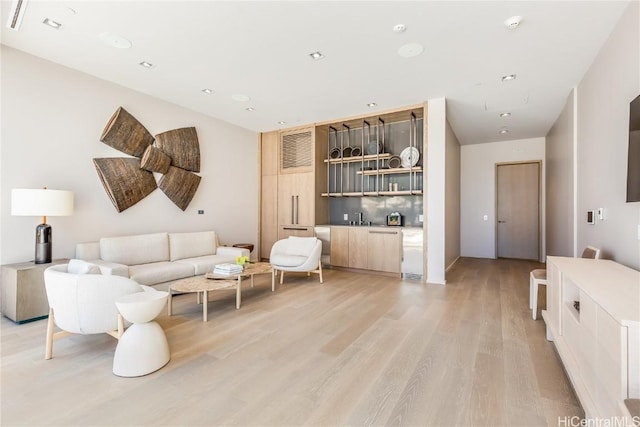 living room featuring light wood-style flooring