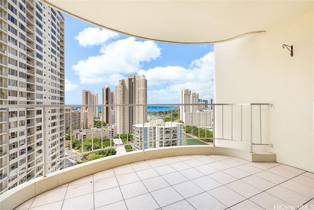 balcony featuring a city view