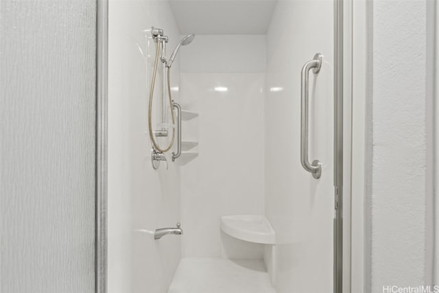 bathroom featuring a stall shower