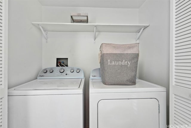 clothes washing area with laundry area and independent washer and dryer