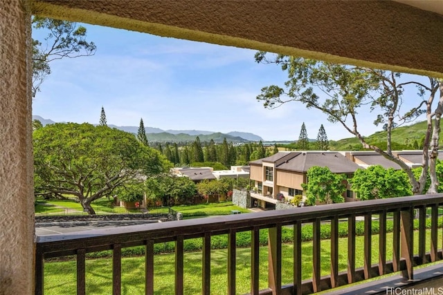 balcony featuring a mountain view