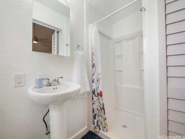 full bathroom featuring a stall shower