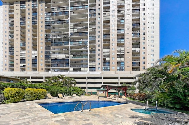 view of swimming pool featuring a patio