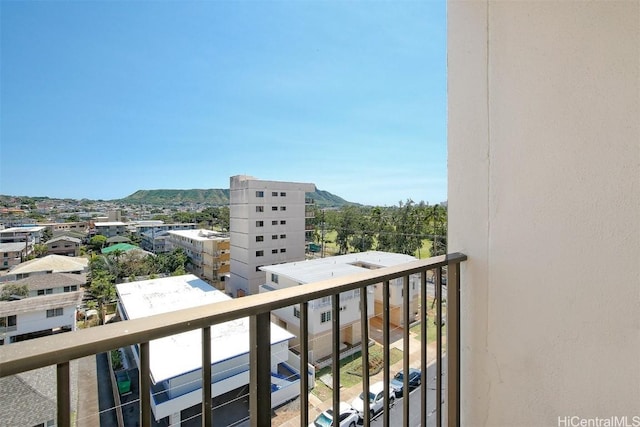 balcony featuring a mountain view