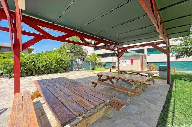 view of patio featuring outdoor dining space and grilling area