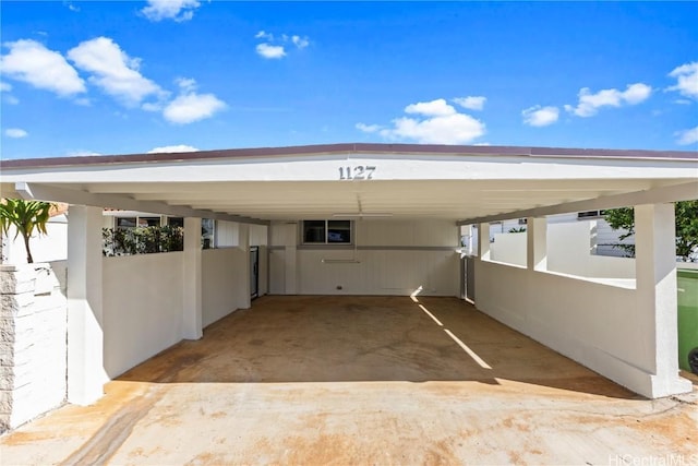 view of parking featuring a carport