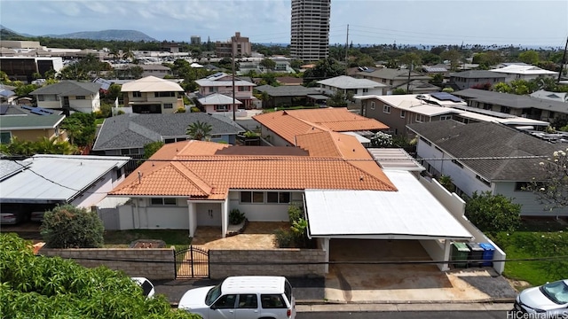 birds eye view of property featuring a mountain view