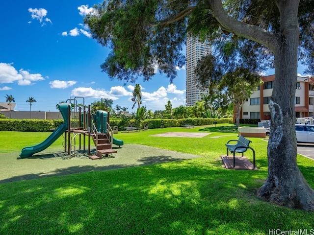 community play area with a yard