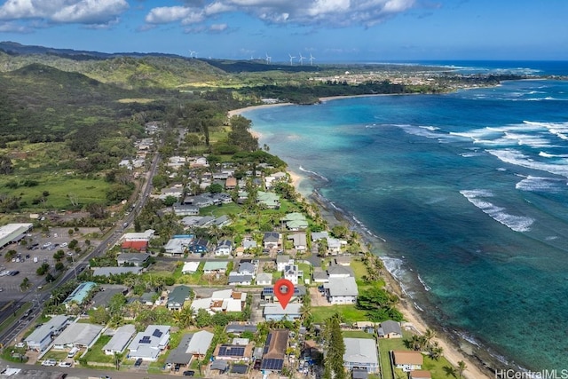 aerial view with a residential view, a water view, and a beach view