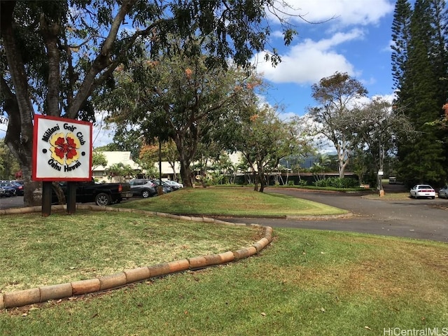 view of street with curbs