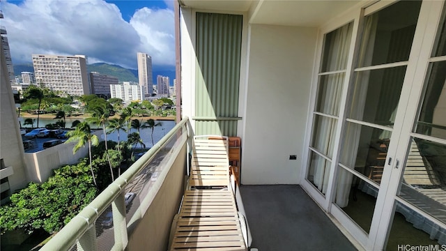 balcony featuring a view of city