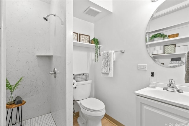 bathroom with toilet, visible vents, a walk in shower, and vanity