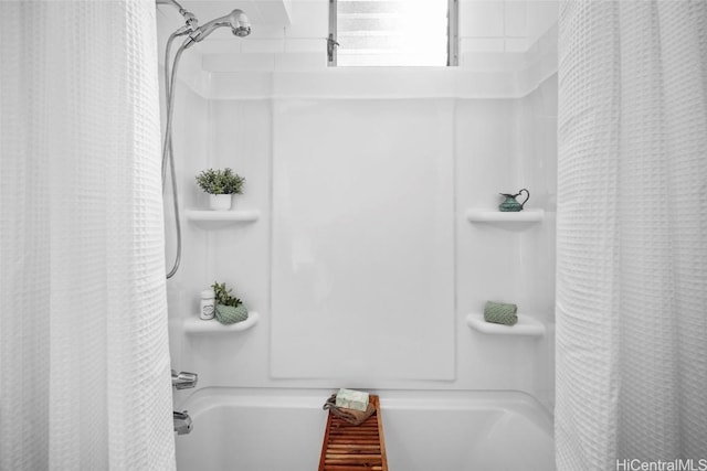 full bathroom with shower / bathtub combination with curtain