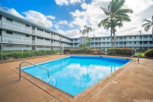 community pool with fence