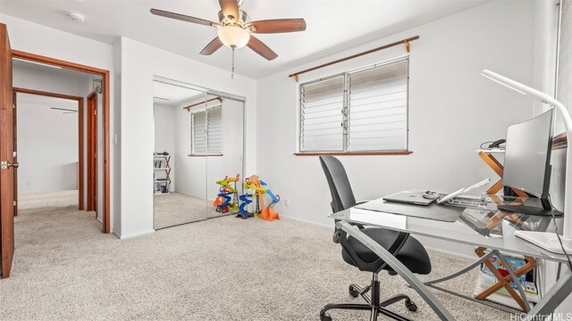 office area with carpet and ceiling fan