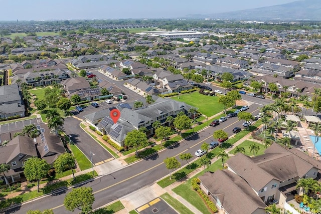 birds eye view of property with a residential view