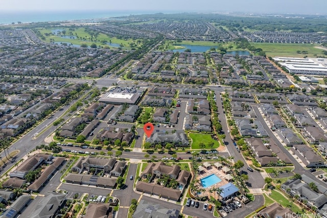 bird's eye view with a water view